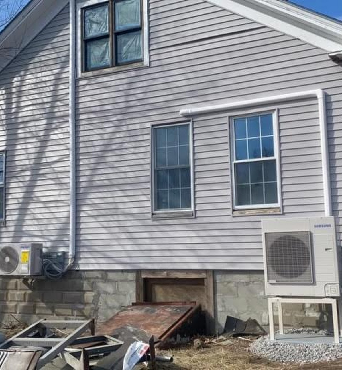 Mini-split units installed on the exterior of a home